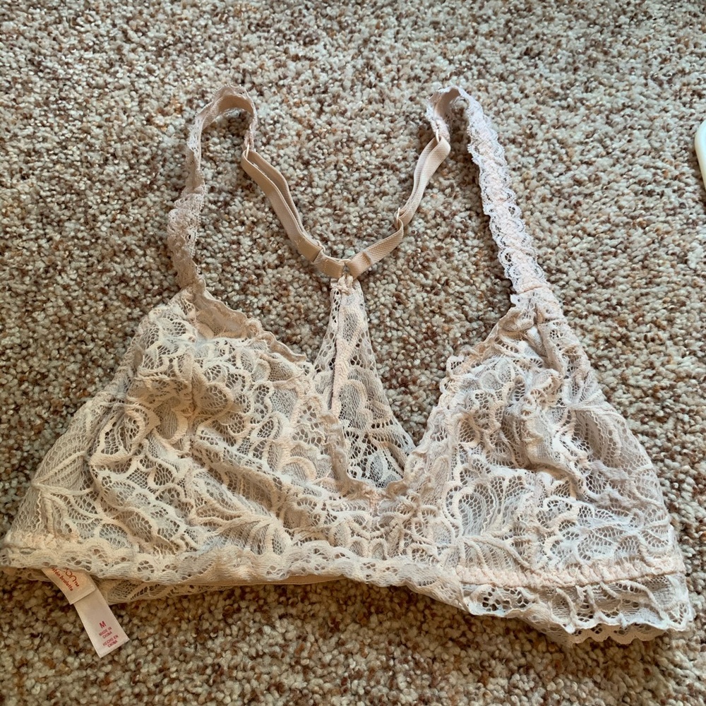 Light pink/peach colored bralette